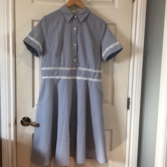 Blue and white striped dress with lace detailing